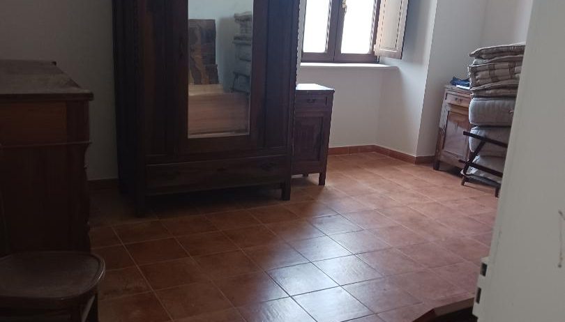 Vacation home for sale with plot of land