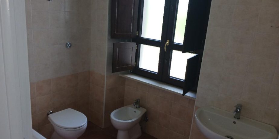 Vacation home for sale with plot of land