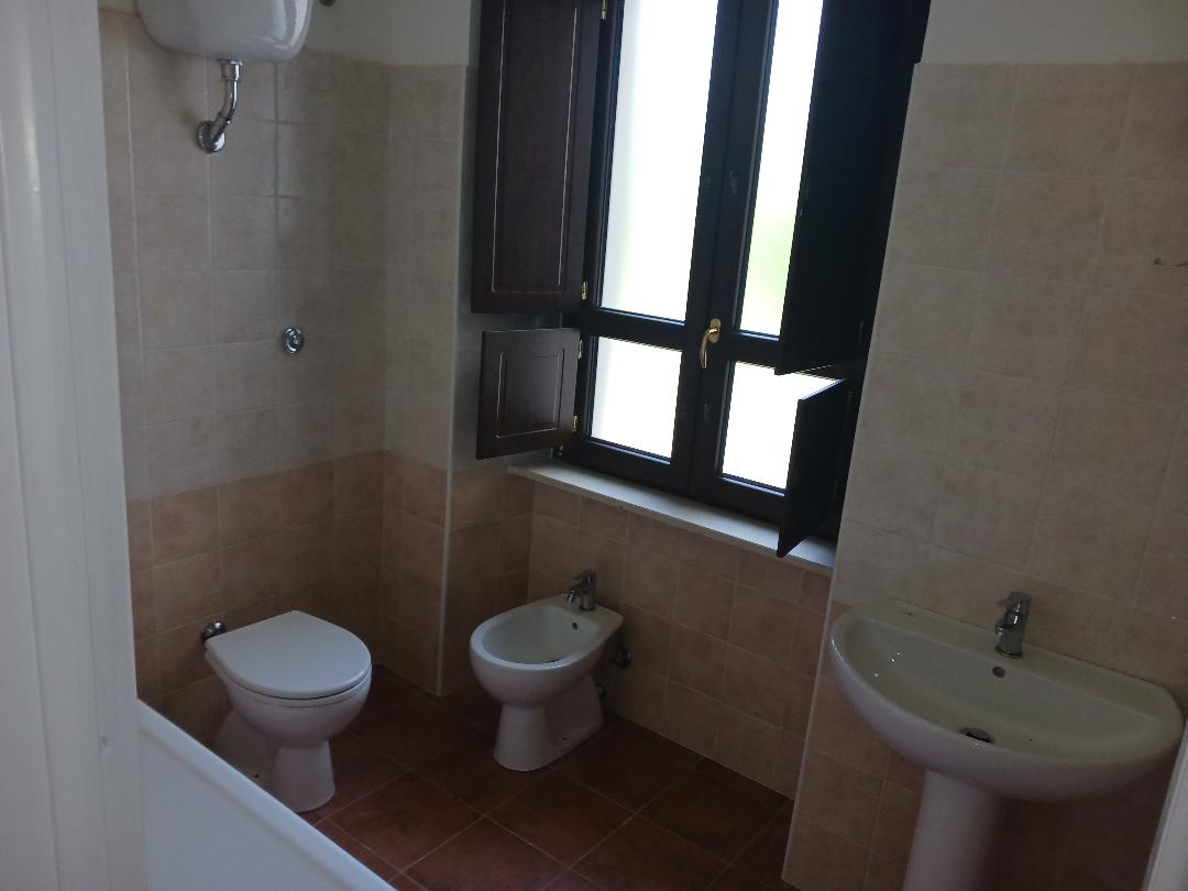 Vacation home for sale with plot of land