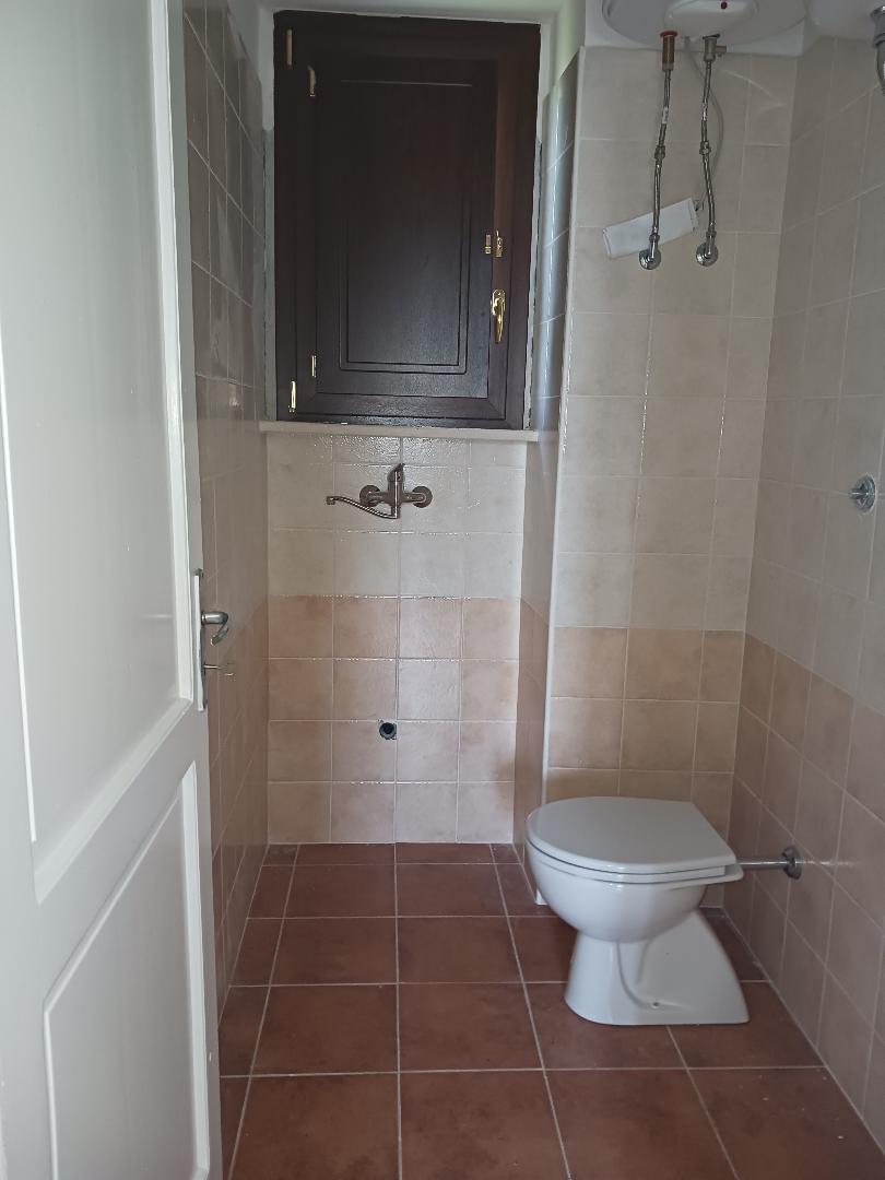 Vacation home for sale with plot of land