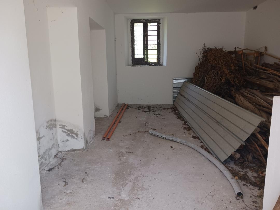 Vacation home for sale with plot of land