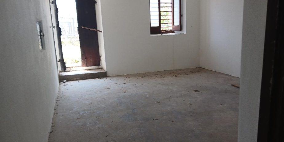 Vacation home for sale with plot of land