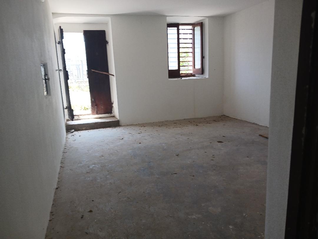 Vacation home for sale with plot of land