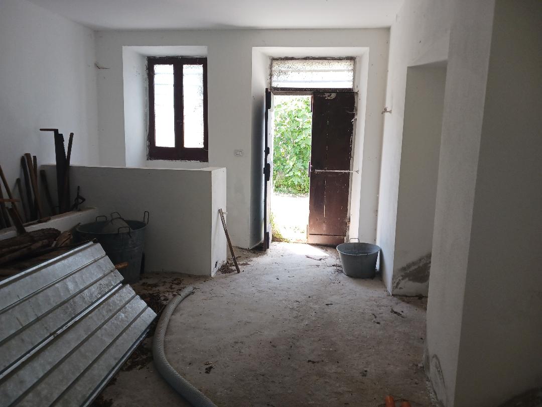 Vacation home for sale with plot of land