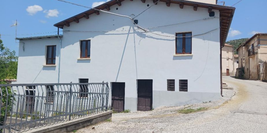 Vacation home for sale with plot of land