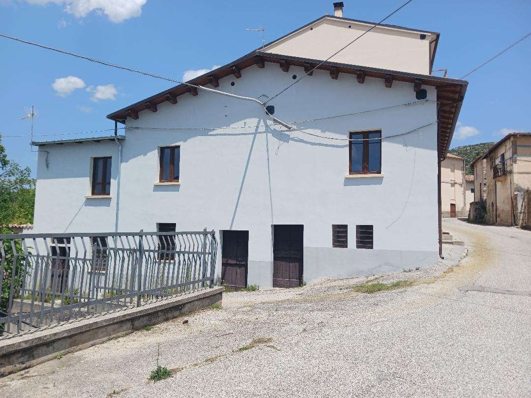 Vacation home for sale with plot of land