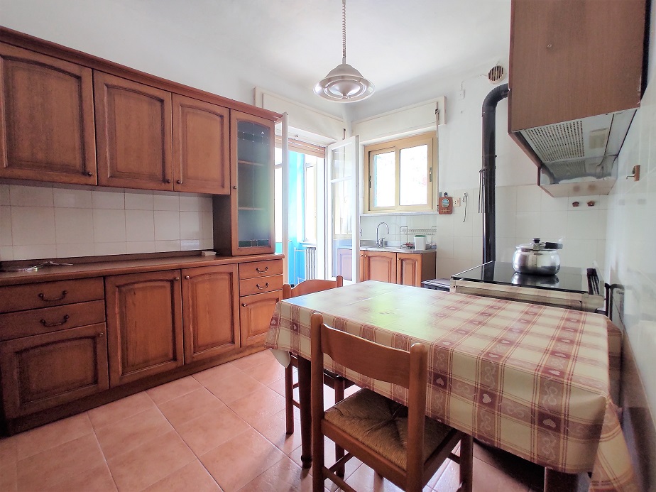 Semi-detached villa with land and warehouses.