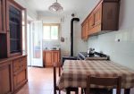 Semi-detached villa with land and warehouses.