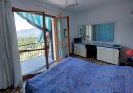 Penthouse in a semi-detached villa with independent entrance, terrace on the floor and garden