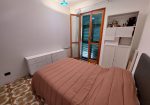 Penthouse in a semi-detached villa with independent entrance, terrace on the floor and garden