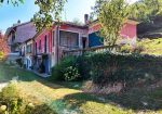 Large house to renovate with large private land in the village