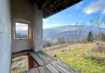 Farmhouse with land and private water source.