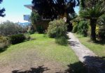 Penthouse in a semi-detached villa with independent entrance, terrace on the floor and garden