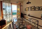 Penthouse in a semi-detached villa with independent entrance, terrace on the floor and garden