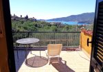 Penthouse in a semi-detached villa with independent entrance, terrace on the floor and garden