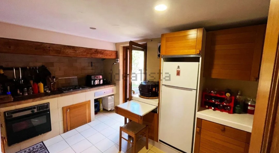 Terraced house surrounded by a 12.000 outdoor space