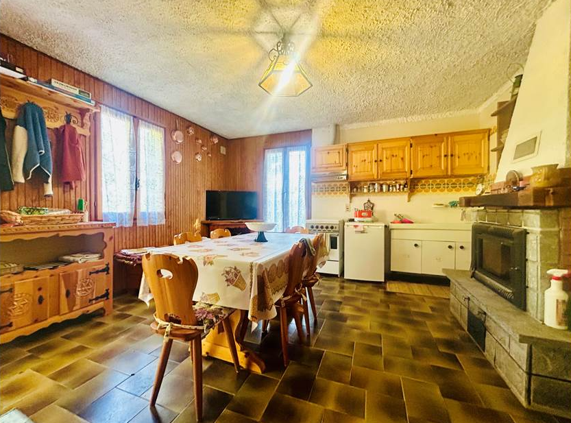 Detached villa with surrounding land.