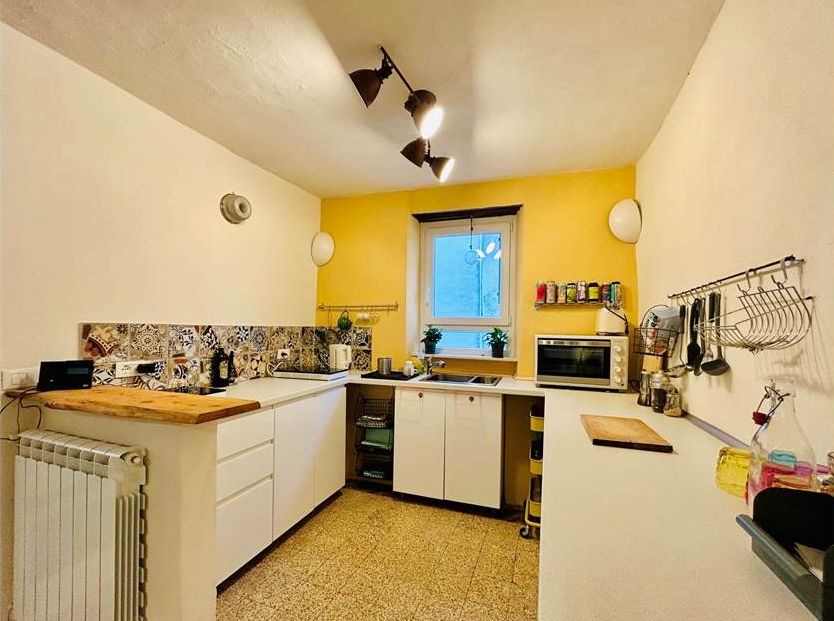 Semi-detached house with warehouse and garage.