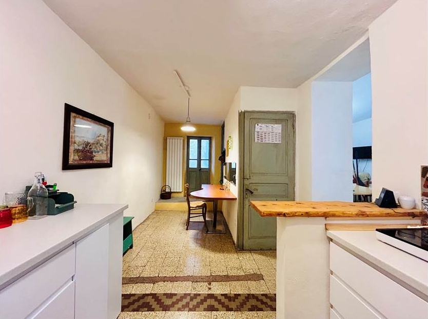 Semi-detached house with warehouse and garage.