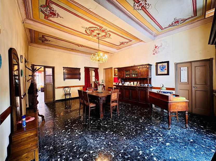 Apartment requiring modernization, featuring original period frescoes