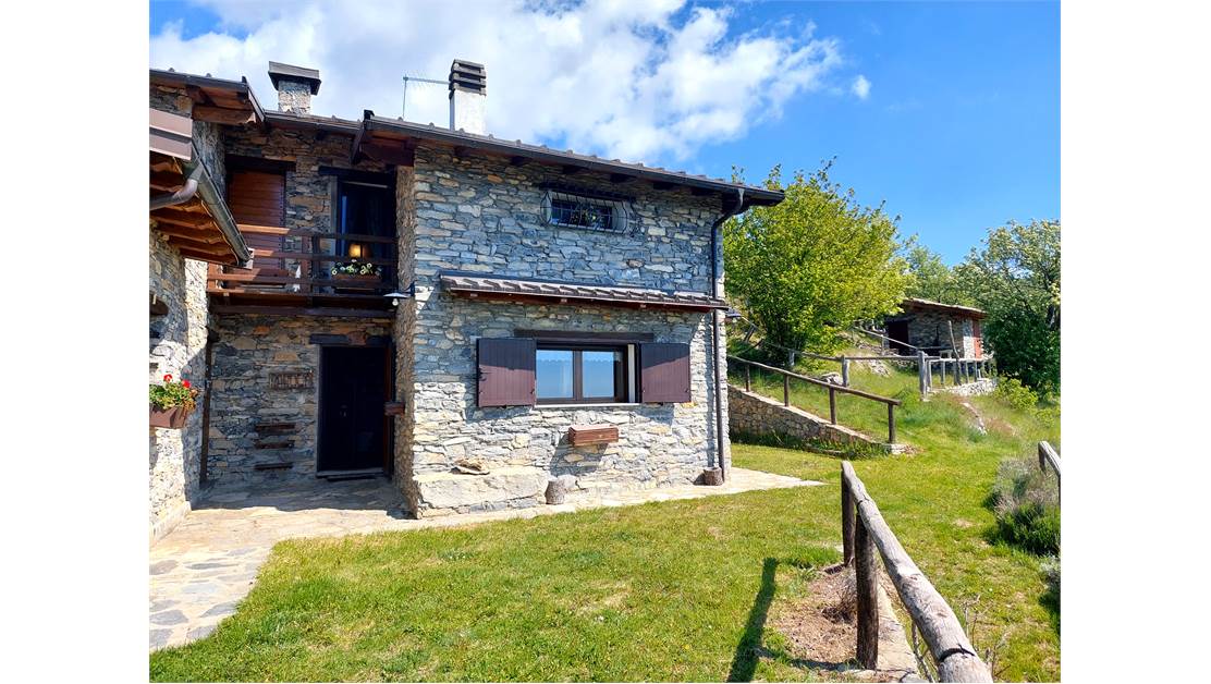 Characteristic house between Alps and sea