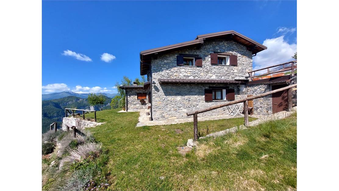 Characteristic house between Alps and sea