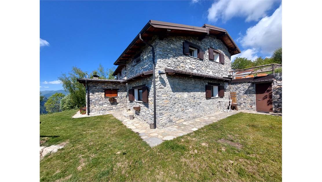 Characteristic house between Alps and sea