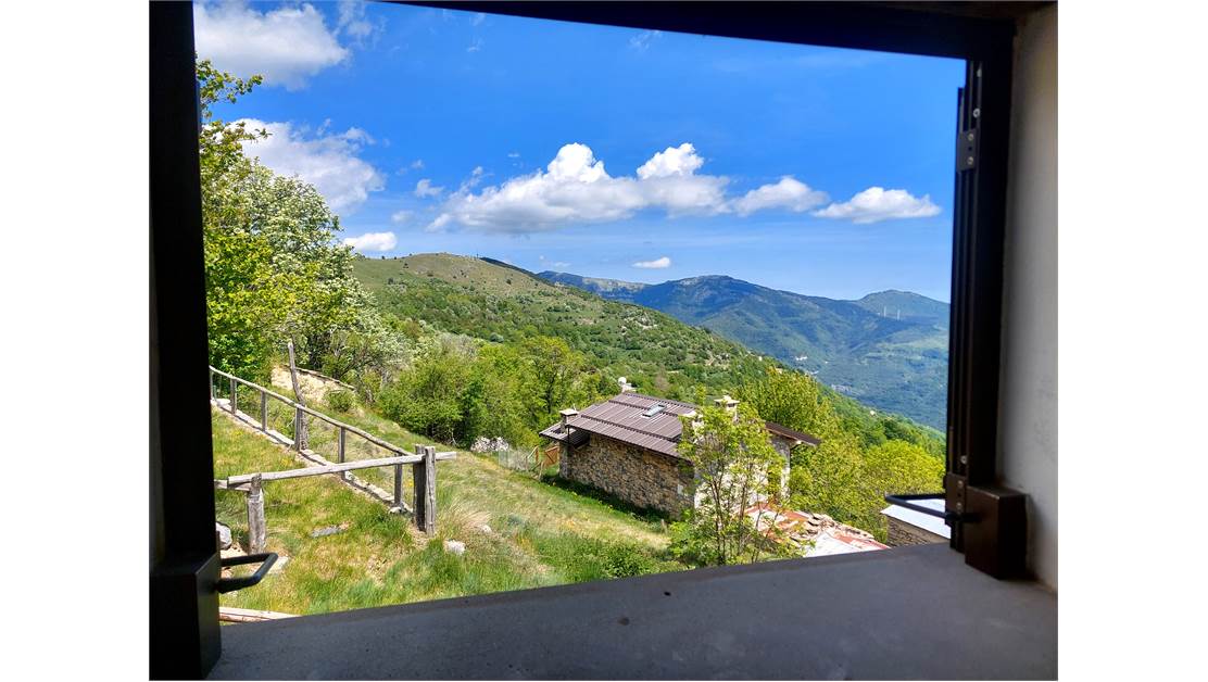Characteristic house between Alps and sea